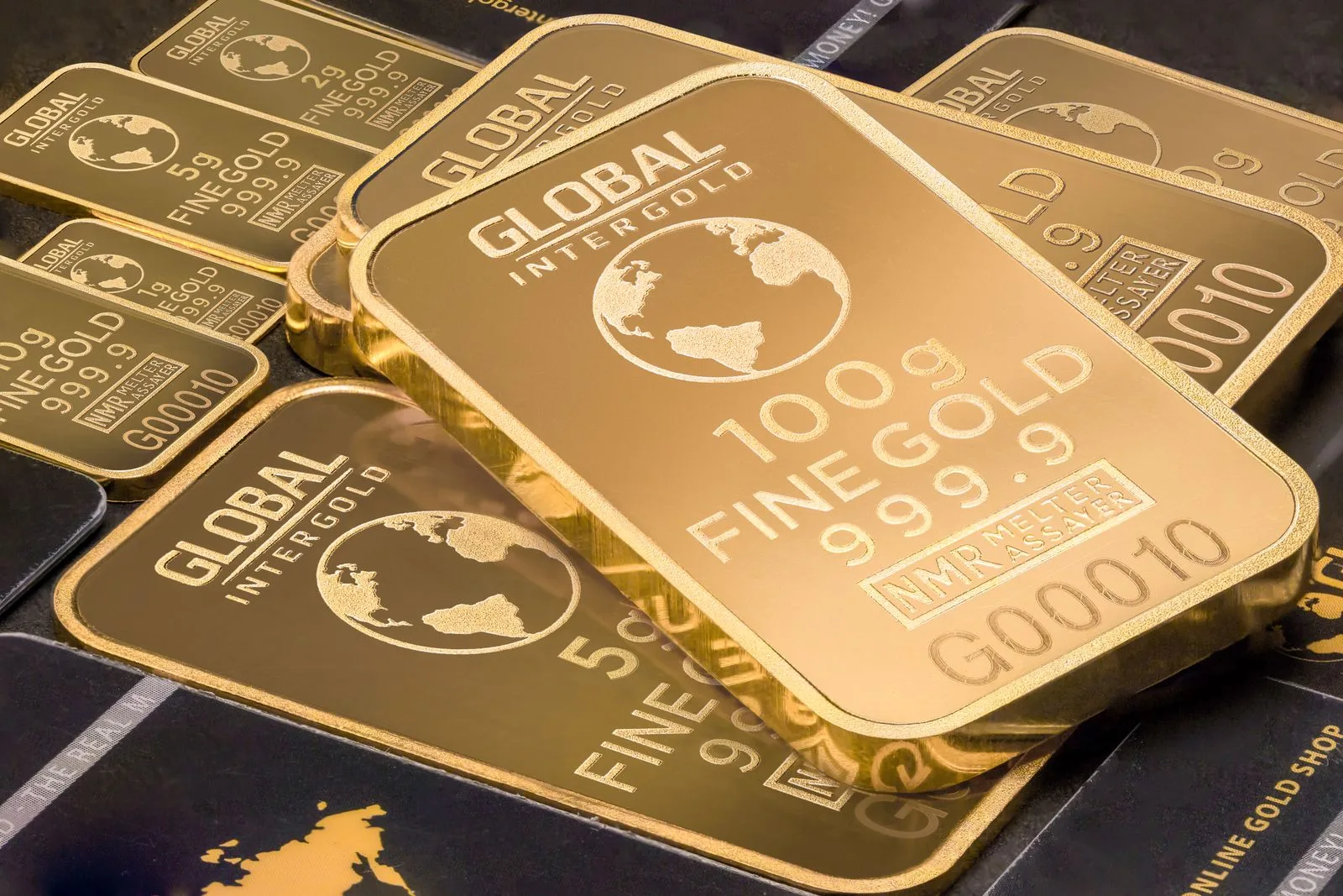 Stacked fine gold bars gleaming as gold price holds 4177 dollars in Asian trading