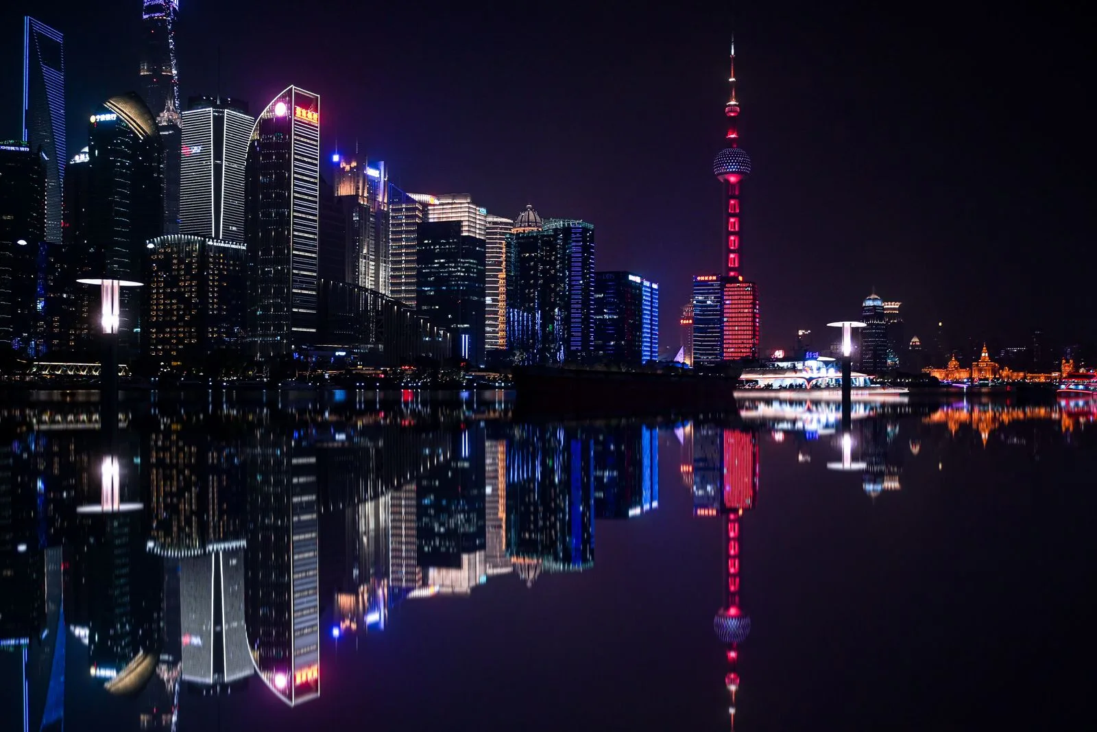 Shanghai Pudong skyline at night as China banks shut 670 lenders in record cleanup