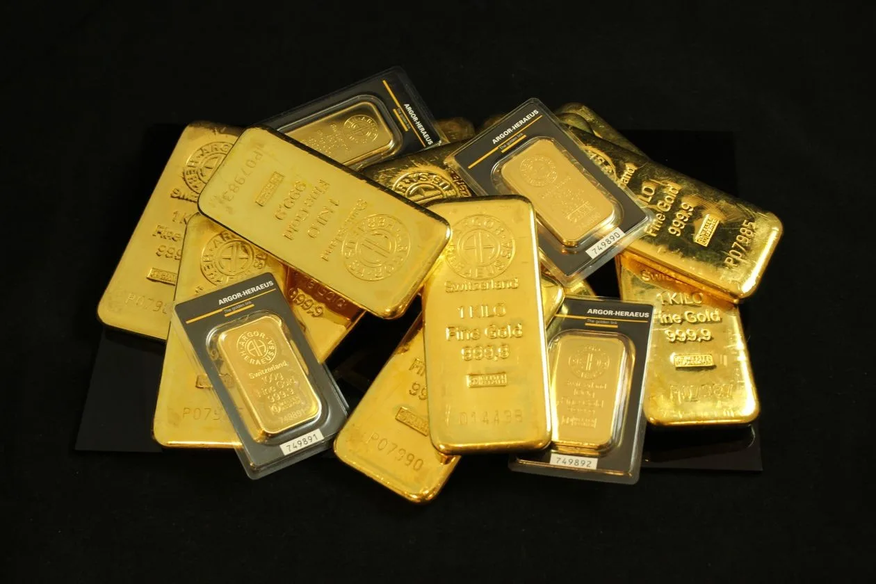 Stacked gold bars as LBMA survey forecasts gold price $5,013