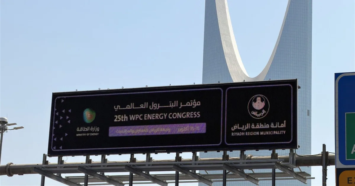 Top oil CEOs absent from Riyadh summit agenda, illustrated by the WPC Energy Congress sign beside Kingdom Tower