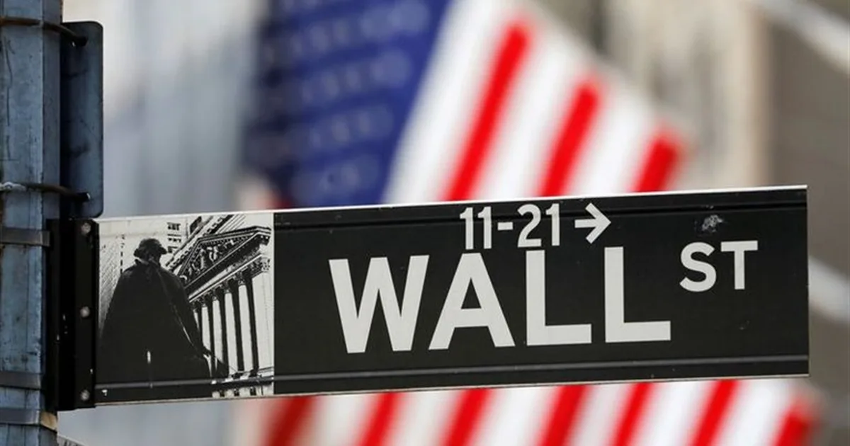 Wall Street sign near the New York Stock Exchange as US inflation reaches 3.7%