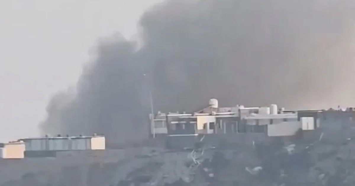 Smoke rises after the Houthi attack on Yemen's presidential palace in Aden